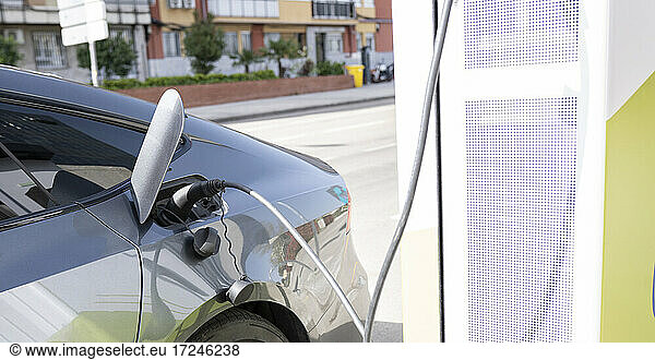 Car charging at electric vehicle station