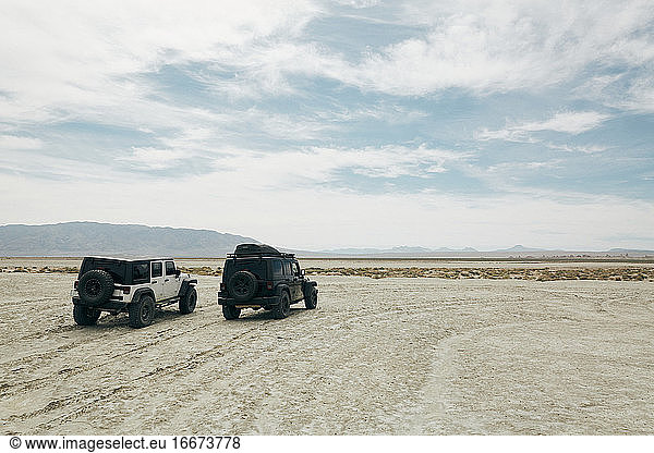 Car off-roading in California desert.