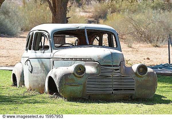 Car wreck of a vintage car at the Canyon Roadhouse  Karas Region  Namibia  Africa