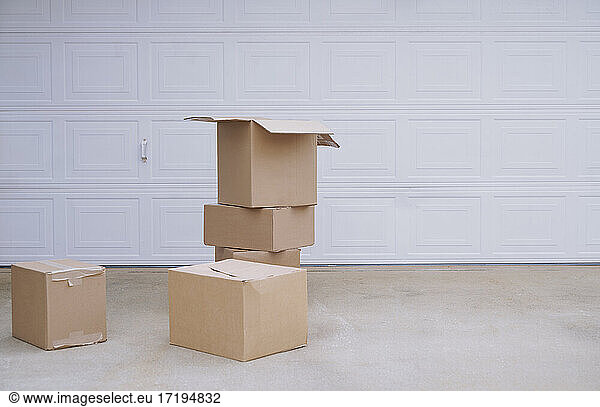 Cardboard boxes at the garage door