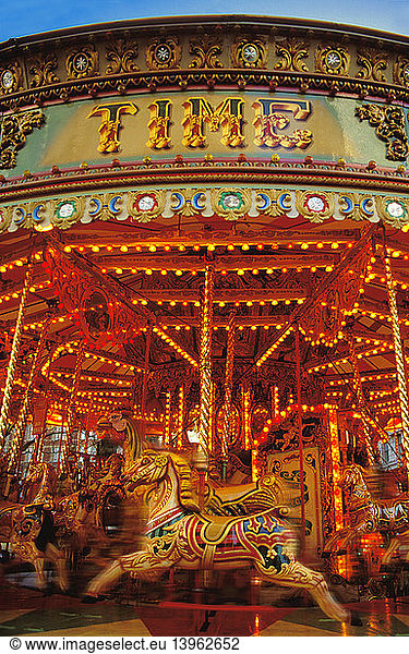 Carousel with horses at a fairground