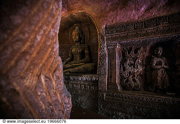 Carved Buddhas inside a mountain