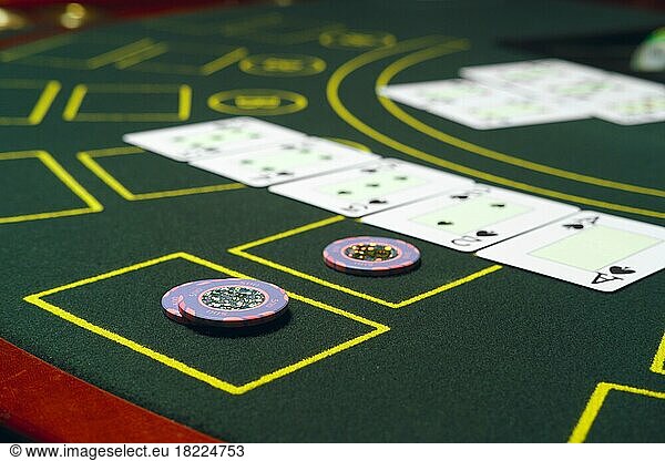Casino black jack table with chips and cards. Winning combination