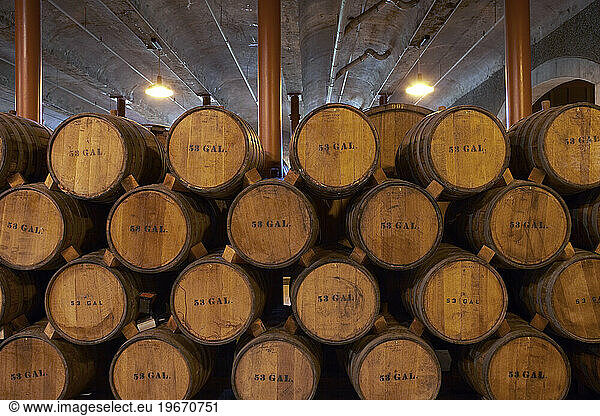 Casks filled with wine at a winery in Napa Valley.