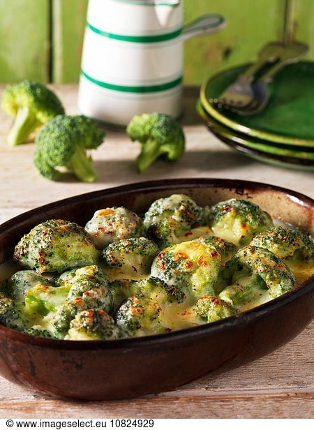 Casserole side dish with broccoli gratin and cheese