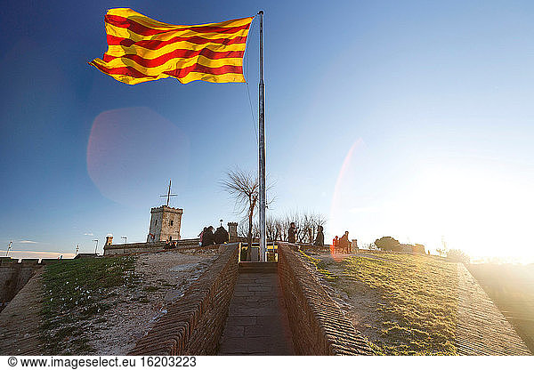 Catalan flag on Monthuic Castle on Montjuic hill  Barcelona  Spain