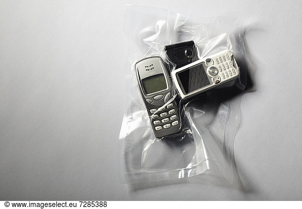 Cell phones shrink wrapped in plastic