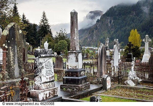 Cemetery with sculpted marble headstones dating from early 20th Century  Queenstown  South Island  New Zealand