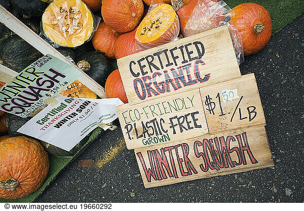 Certified organic winter squash for sale at the Trout Lake Farmer's Market in Vancouver  British Columbia  Canada.