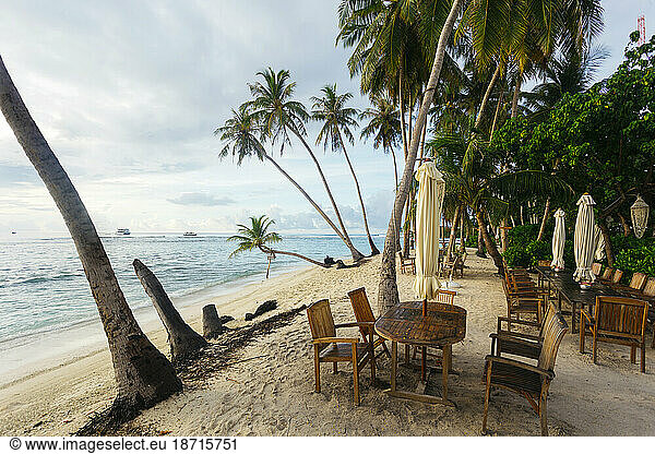 Chairs and table on beach â€ Thulusdhoo  Male  Maldives