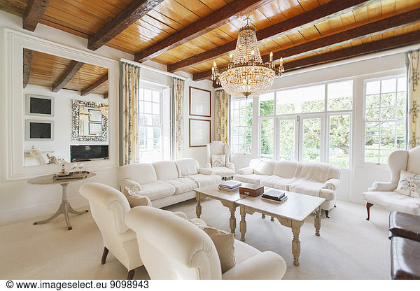 Chandelier hanging in luxury living room