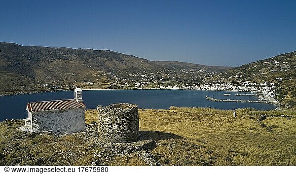 Chapel  stone round tower  drone shot  Korthi  sea  blue cloudless sky  Andros Island  Cyclades  Greece  Europe