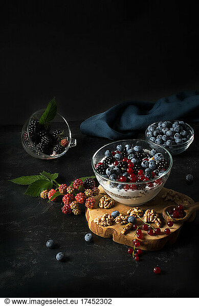 Chia pudding with nuts and berries: blueberries  currants and bl