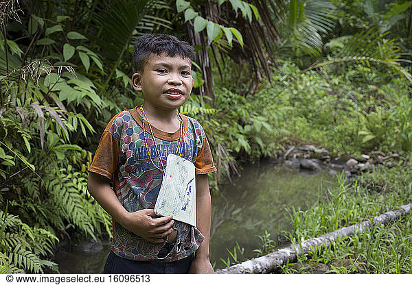 Child returning from school at 2 hours walking  Pulau Siberut  Sumatra  Indonesia