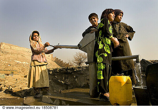 Children are sent to collect well water in Afghanistan  where few homes have running water.