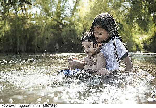 Children enjoying a summer day on the river