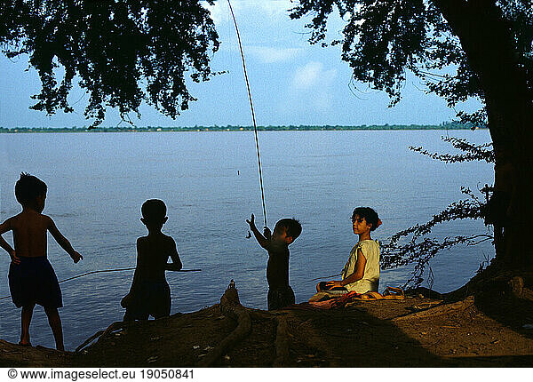 Children fishing  Mekong River/Tonle Sap Lake