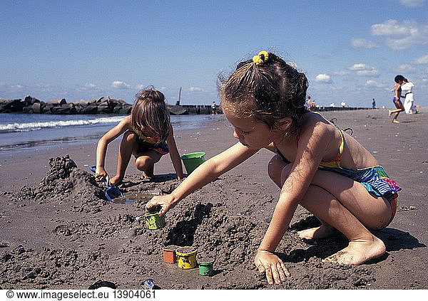 Children Making Sand Castles