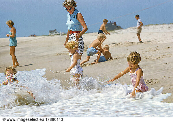 Children playing at Hamptons Beach  Long Island  New York  USA  Toni Frissell Collection  August 1955