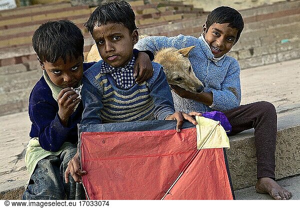 Children playing on the ghats of B?nares with their favorite pastime  kite flying  uttar pradesh  india.