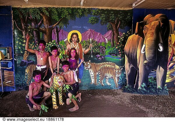 Children Posing at a studio with Lord Ayyappa cut outs  Sabarimala  Kerala  South India  India  Asia