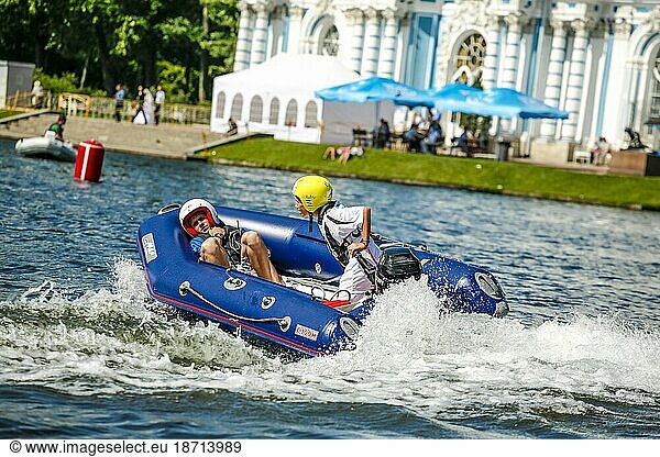 Children Powerboating On Lake During Competition In Saint Petersburg  Russia