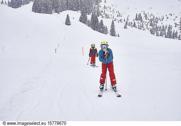 Children skiing in Lauenen  Valais  Switzerland