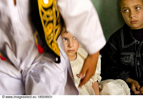 Children wait for a class to begin at a Kabul preschool.