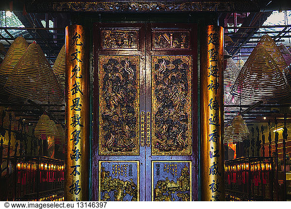 China  Hong Kong  Ma Mo Temple  incense spirals besides main entrance door
