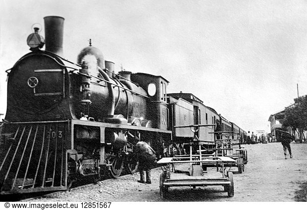 CHINA: SHANGHAI. A Chinese locomotive at train station in Shanghai  China. Early 20th century.