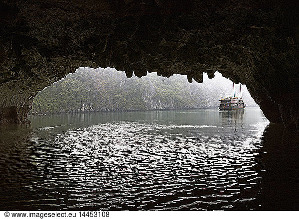 Chinese Junk Seen Through a Cave Entrance