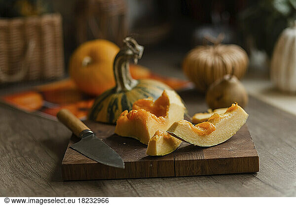 Chopped pumpkin on cutting board