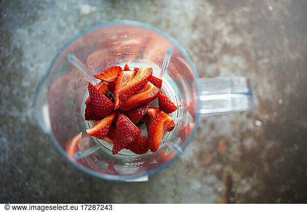 Chopped strawberries in blender