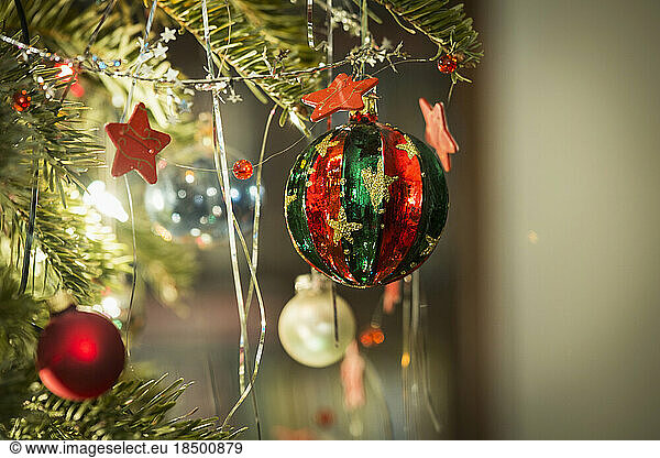 Christmas baubles hanging on Christmas tree  Munich  Germany