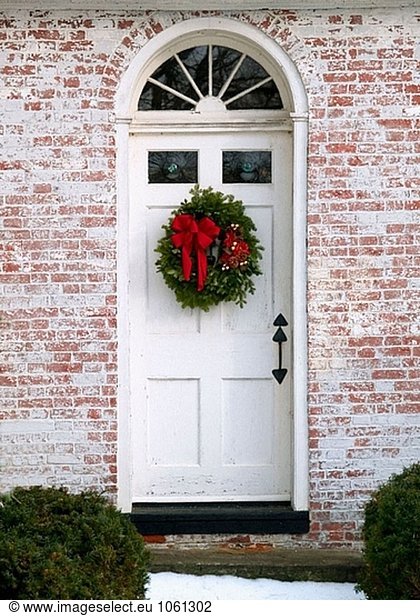 Christmas decorations on door. Amherst  Massachusetts. USA