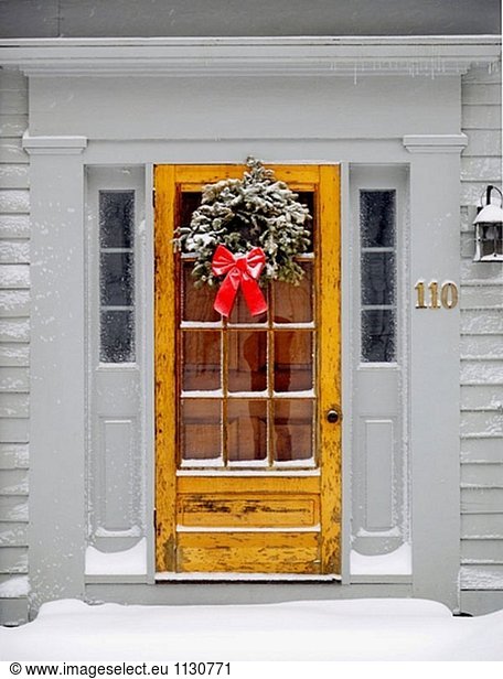 Christmas decorations on door. Amherst  Massachusetts. USA