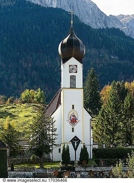 Church St. Johannes der Taeufer (John the Baptist). Village Grainau near Garmisch-Partenkirchen and mount Zugspitze in the Wetterstein mountain range. Europe  Central Europe  Germany.