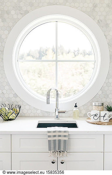 circle window in butlers pantry