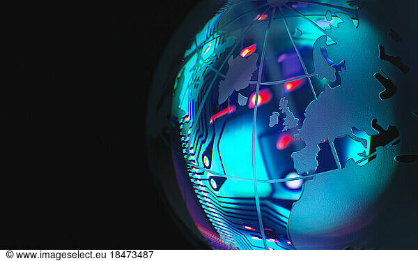 Circuit board reflecting in shiny globe