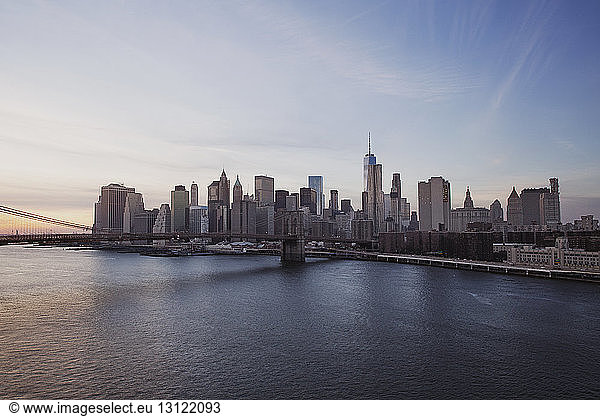City skyline by East River during sunset