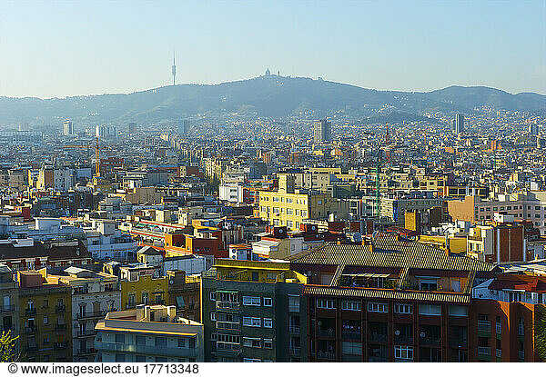Cityscape Of Barcelona With Mountains In The Distance; Barcelona  Spain