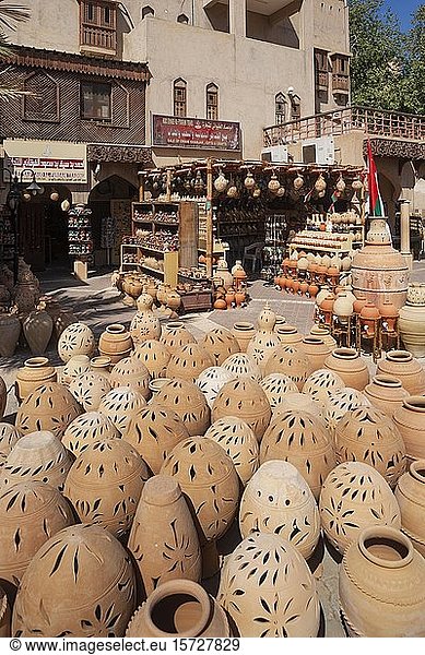 Clay jugs in front of souvenir shops  bazaar  Nizwa Souk  Nizwa  Ad Dakhiliyah  Oman  Asia