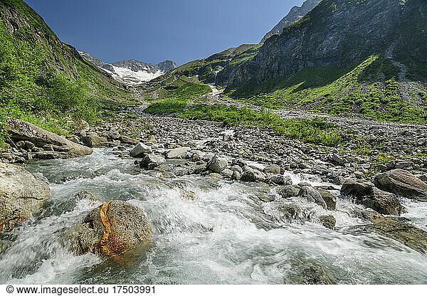 Clear mountain stream in Zillertal Alps