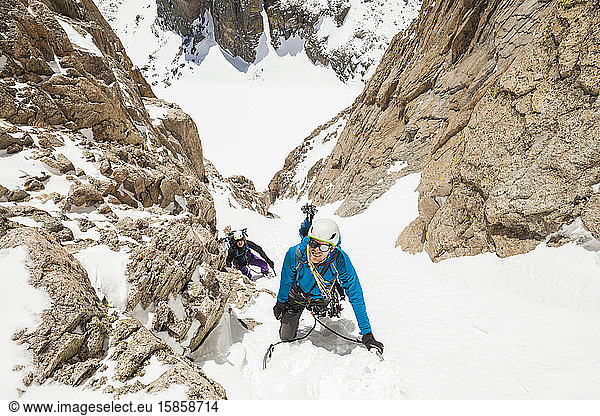 Climbers ascend snow couloir on Mount Lady Washington