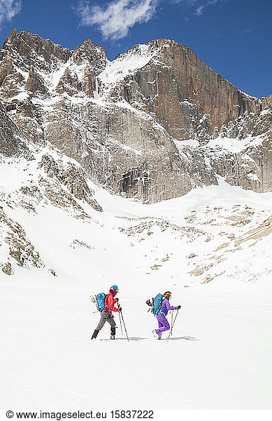 Climbers hike below Longs Peak  Rocky Mountain National Park