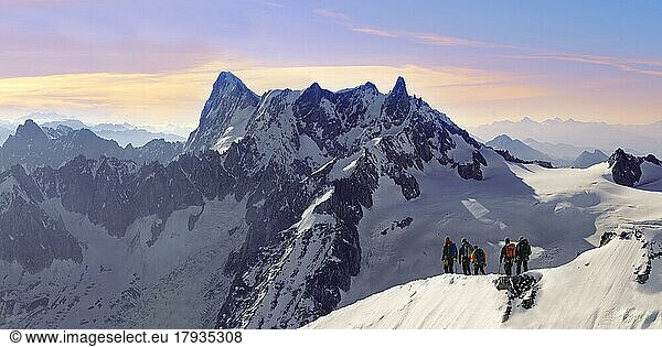 Climbers leaving Alguille du Midi for the Mont Blanc Massif  Chamonix Mont Blanc  France  Europe