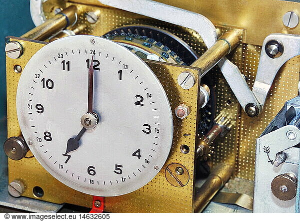 clocks  clockwork  Germany  circa 1952  1950s  50s  20th century  historic  historical  wheelwork  clock  clocks  attendance recorder  attendance recorders  clock face  clockface  clock dial  face  watch face  clock faces  clockfaces  clock dials  faces  watch faces  watch hand  clock hand  watch hands  clock hands  detail  mechanics  mechanical system  mechanical  time  time of day  ask the time  7  seven  o'clock  time  times