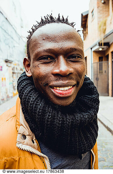 close up black man of african ethnicity smiling