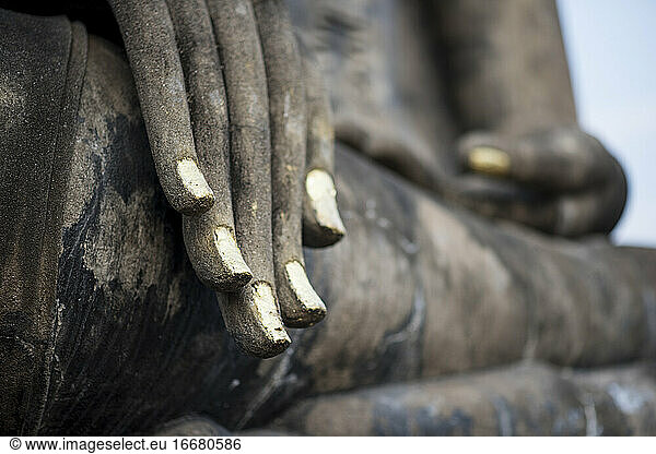 Close up detail of the hand of the Buddha statue at Wat Mahatat temple   Sukhothai Historical Park  Sukhothai  Thailand.
