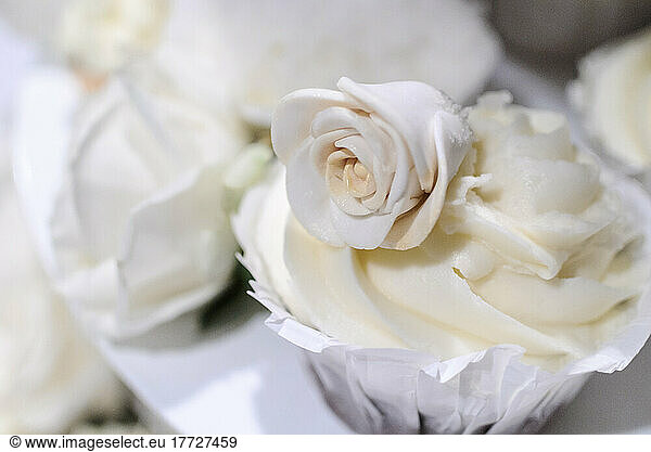 Close up of a wedding cupcake decoration  a suger rose.